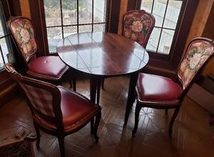 lot 66 image: Drop Leaf Dining Table with 3 Leaves and 4 Chairs