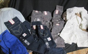 lot 200 image: Large Lot of Girls JeansJeggins, & Shorts (Size 7-8) Some Cleaning Needed 7B