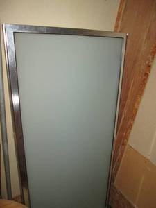 lot 256 image: Storage Room of Goodies Shower Doo...