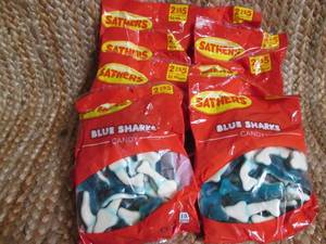 lot 262 image: (8) 9oz. Sathers Blue Sharks Gummy ...