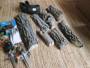 lot 339 image: Cement Logs, Bike Tire, & Lawn Spri...