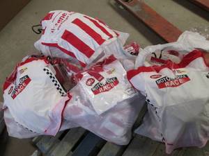 lot 374 image: Large Lot of Ladies Shirts Various Sizes (Long & Short Sleeve) Bleeding of Red Dye See Photos