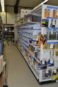 lot 3 image: Store Shelving - 4 Foot Double-Sided Sections with Peg Board Backing & Storage Drawer, End Cap Peg Board included.