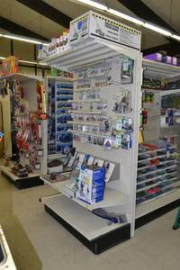 lot 21 image: Store Shelving - 4 Foot Single Sided Section with Peg Board Backing & Storage Drawer