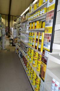 lot 24 image: Store Shelving - 4 Foot Double Sided Section Including Sliding Panel and Shelves with Peg Board Backing & Storage Drawer