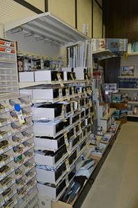 lot 31 image: Store Shelving - 4 Foot Single Sided Sections with Peg Board Backing & Storage Drawer