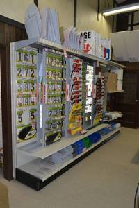 lot 34 image: Store Shelving - 4 Foot Single Sided Sections with Peg Board Backing & Storage Drawer