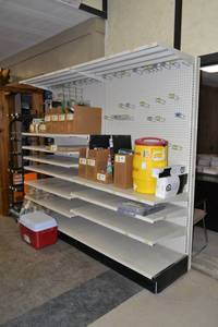 lot 38 image: Store Shelving - 4 Foot Single Sided Sections with Peg Board Backing & Storage Drawer