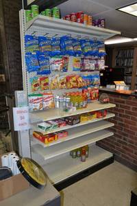 lot 53 image: Store Shelving - 4 Foot Single Sided Sections with Peg Board Backing & Storage Drawer