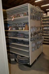 lot 85 image: Store Shelving - 4 Foot Double Sided Section and Shelves with Peg Board Backing and on each end
