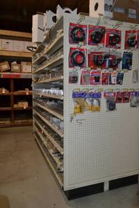 lot 86 image: Store Shelving - 4 Foot Double Sided Section and Shelves with Peg Board Backing and on Each End