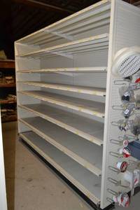 lot 88 image: Store Shelving - 4 Foot Double Sided Section and Shelves with Peg Board Backing and on Each End