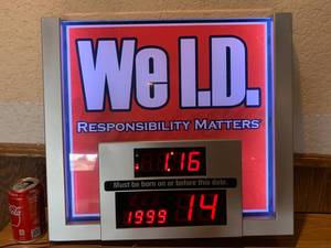 lot 3 image: We ID Born Before Clock  Sign