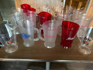 lot 18 image: Lot of 19 Plastic Beer Pitchers