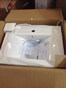 lot 14 image: HOME DECORATORS COLLECTION Cedarton 24 in. W x 18 in. D Vanity in White with Ceramic Vanity Top in White