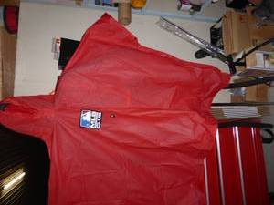 lot 63 image: 12 new rain ponchos, fishing and ba...
