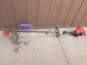 Troy Bilt 4 cycle gas line trimmer.  Tested & works. As shown.