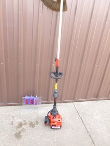 Troy bilt 2 cycle line trimmer. Tested & works. As shown.