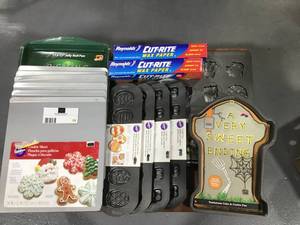 lot 15 image: Lot of  15  Baking Sheets and Easter and Halloween Cookie Molds