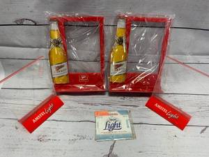 lot 68 image: Rare 7 Hamms Light Labels & Ad Holders