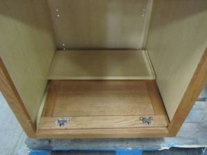 lot 95 image: Hampton Assembled 24x34.5x24 in. Base Kitchen Cabinet with Ball-Bearing Drawer Glides in Medium Oak KB24-MO