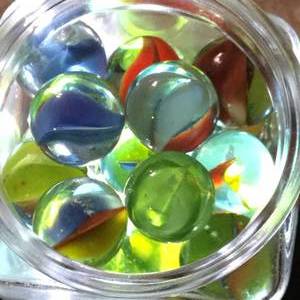 JAR OF MISC MARBLES