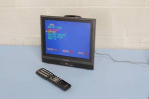 lot 79 image: Sharp Aquos 13 Compact LCD TV  Television & Remote Control