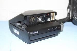 lot 114 image: Vintage Polaroid Instant Camera Spectra SE with Accessories