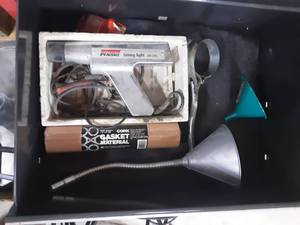 lot 43 image: Contents Of Drawer Timing Light, Cork Gasket Material, Funnels & Misc.