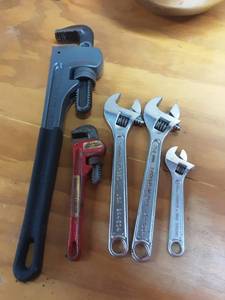 lot 48 image: 18 Pipe Wrench, 8 Pipe Wrench, 2-10 Inch Craftsman Adjustable Wrenches, 1-6 Craftsman Adjustable Wrench