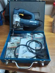 lot 53 image: Bosch Jig Saw With Extra Blades
