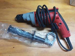 lot 54 image: Milwaukee 12 Electric Drill