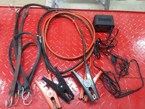 lot 87 image: Jumper Cables, Battery Charger, Bungee Cords