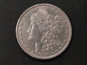 lot 6 image: 1880 O Morgan Silver Dollar...
