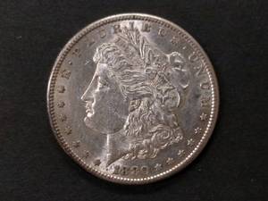 lot 7 image: 1880 S Morgan Silver Dollar...