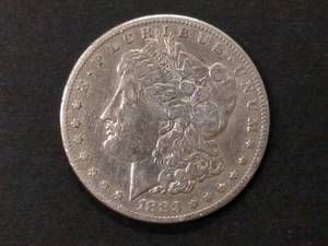 lot 11 image: 1883 S Morgan Silver Dollar...