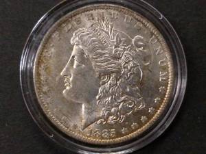 lot 15 image: 1885 O High Grade Morgan Silver Dol...