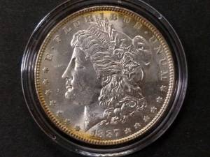 lot 18 image: 1887 High Grade Morgan Silver Dolla...