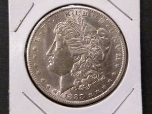 lot 20 image: 1888 S Morgan Silver Dollar...