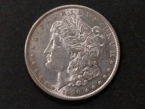 lot 24 image: 1890 S Morgan Silver Dollar...