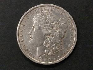 lot 30 image: 1897 O Morgan Silver Dollar...