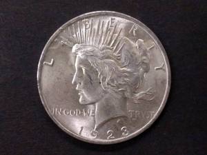 lot 61 image: 1923 AU Peace Silver Dollar...