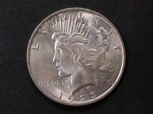 lot 62 image: 1923 AU Peace Silver Dollar...