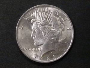 lot 63 image: 1923 AU Peace Silver Dollar...