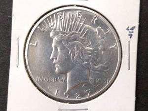 lot 74 image: 1927 High Grade Peace Silver Dollar...
