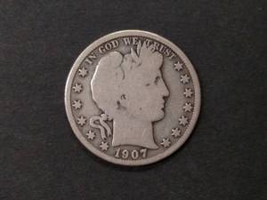 lot 79 image: 1907 O Barber Silver Half Dollar...