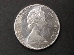 lot 154 image: 1965 Canada .80 Silver Dollar...