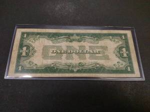 lot 164 image: 1928 A Funny Back One Dollar Silver...
