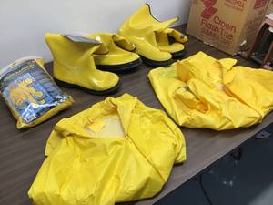 lot 27 image: Mixed Lot Of Rain Gear 1 3pc Rain Suite, 2 Pair Size 10 Rain Boots, 1 Jacket Large, 1 Jacket 2XL