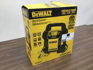 lot 44 image: Dewalt 1400 Peak Amp Jump Starter with Digital Compressor